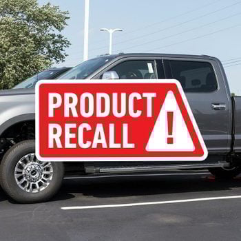 Gray 2021 Ford F-250 Super Duty in a parking lot with a red "Product Recall" notice overlaid in front